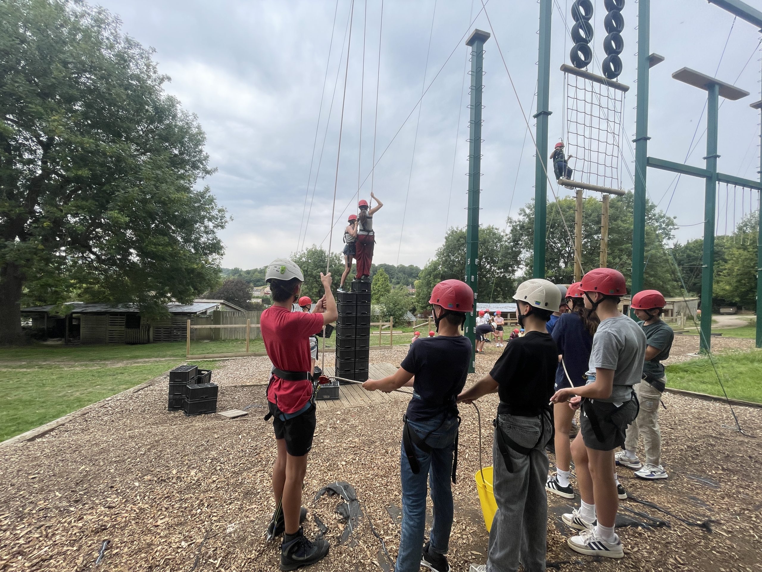 Students play a game with pulleys.