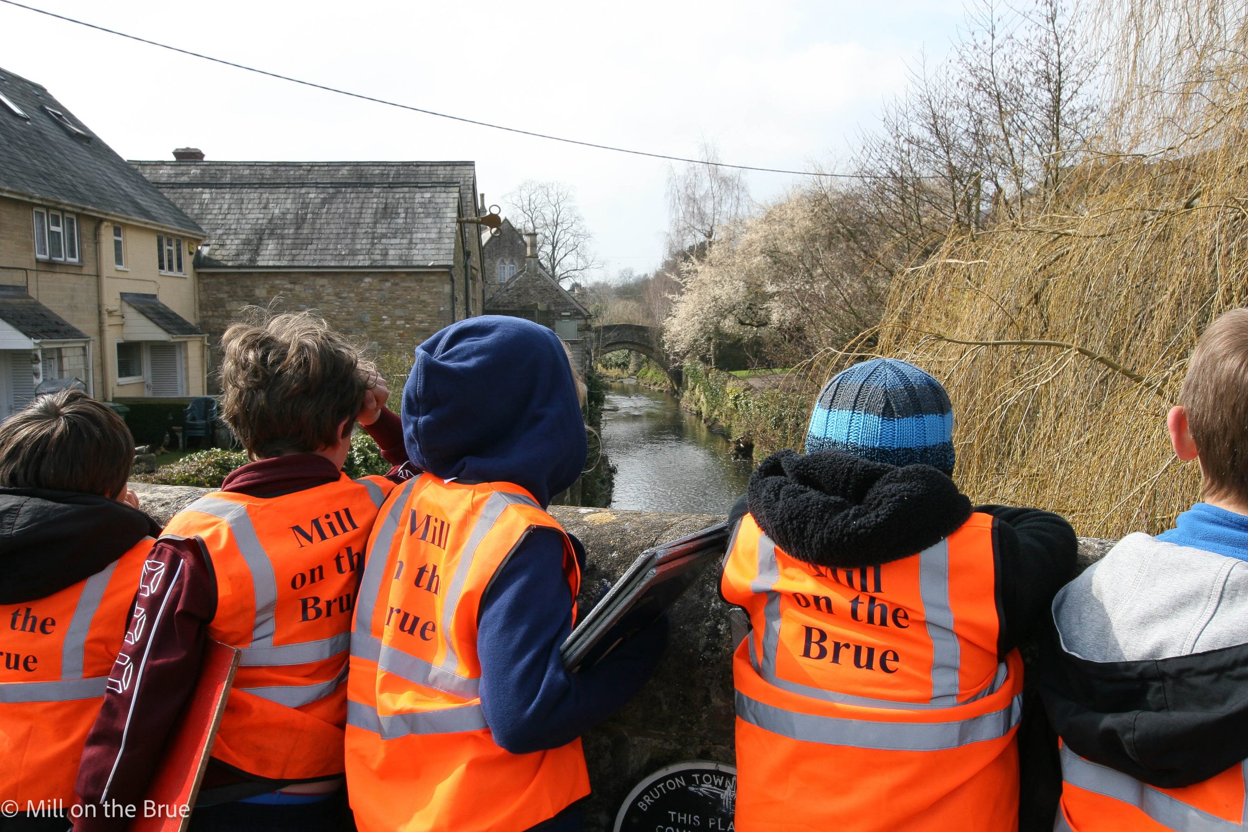 Children on a bridge in Bruton.